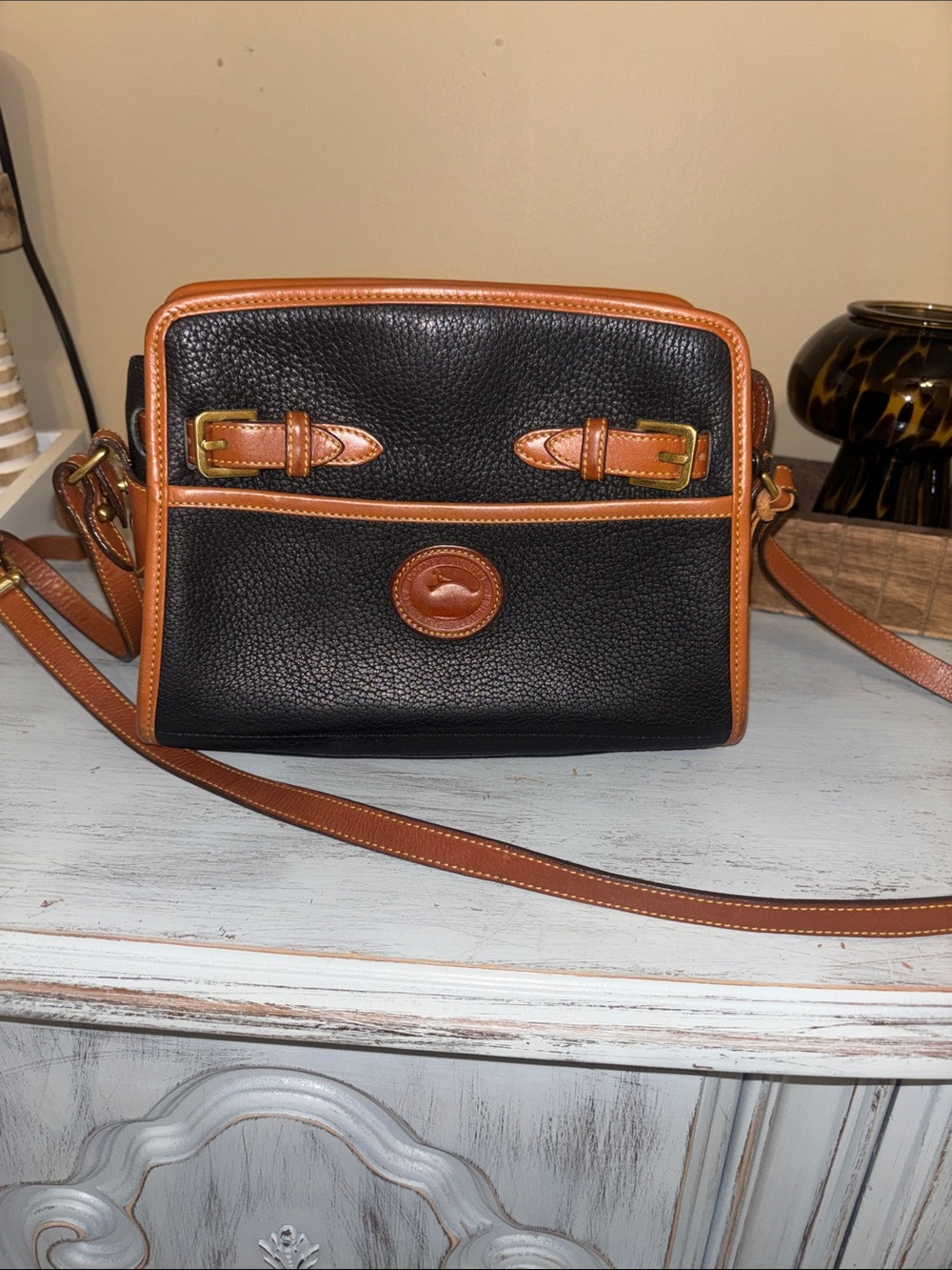 Dooney & Bourke Black Leather Crossbody with Brown Trim and Gold Hardware